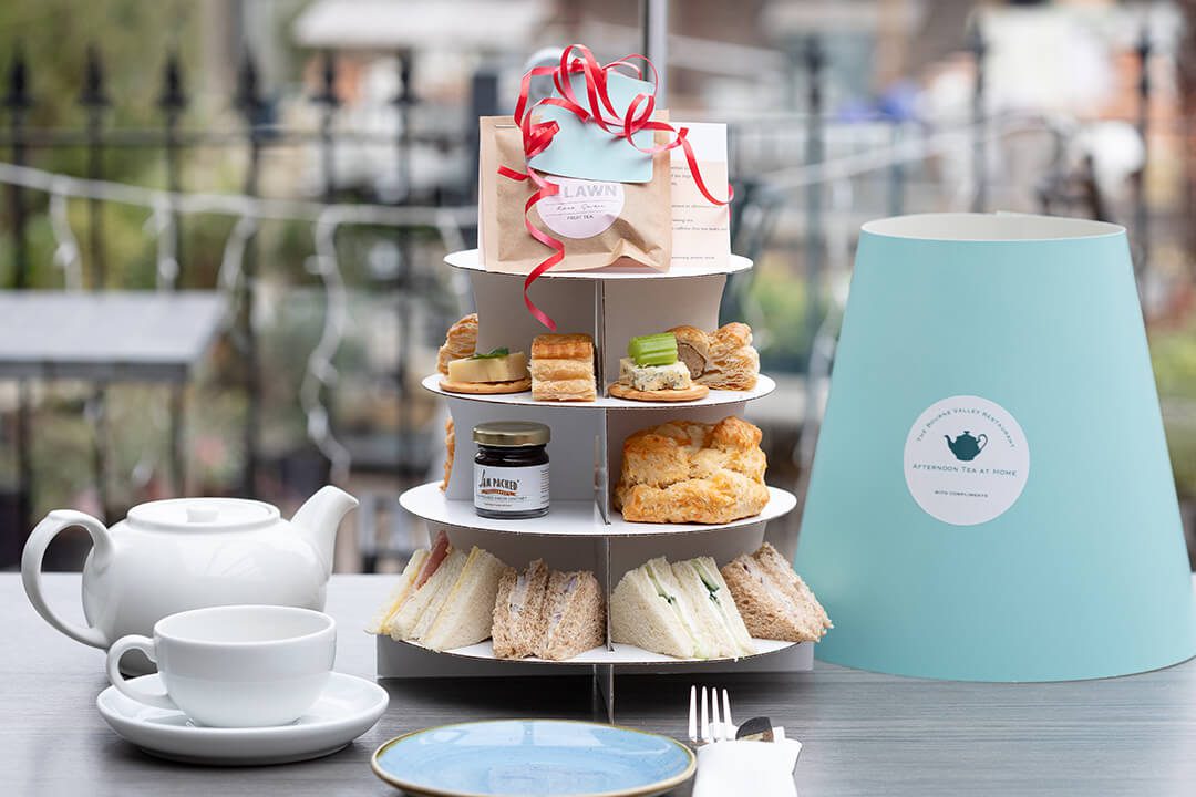 A close up image of a takeaway afternoon tea showing the sustainable packaging used.