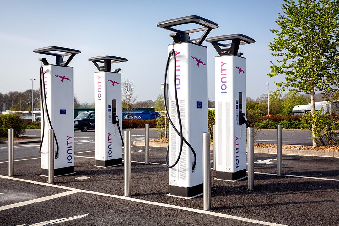 A view of a set of high speed charging points for electric cars at a motorway services