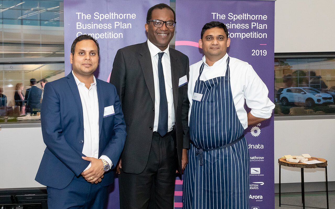 A pair of competition participants pictured with Kwasi Kwarteng, the business secretary.